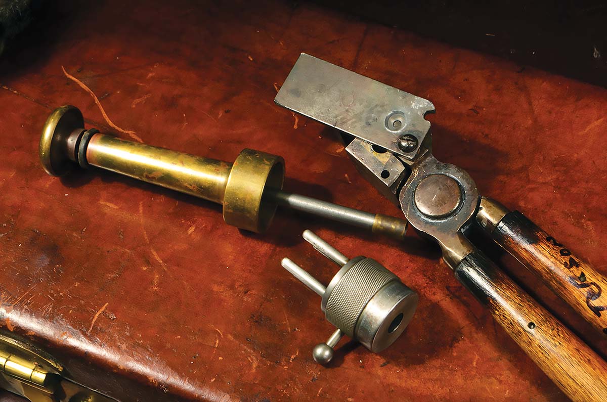 Vintage loading tools from a Pope-Stevens, including the false muzzle, bullet starter and Pope bullet mould.